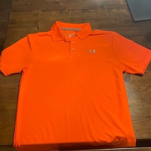 Bright orange Under Armour short sleeve golf shirt.